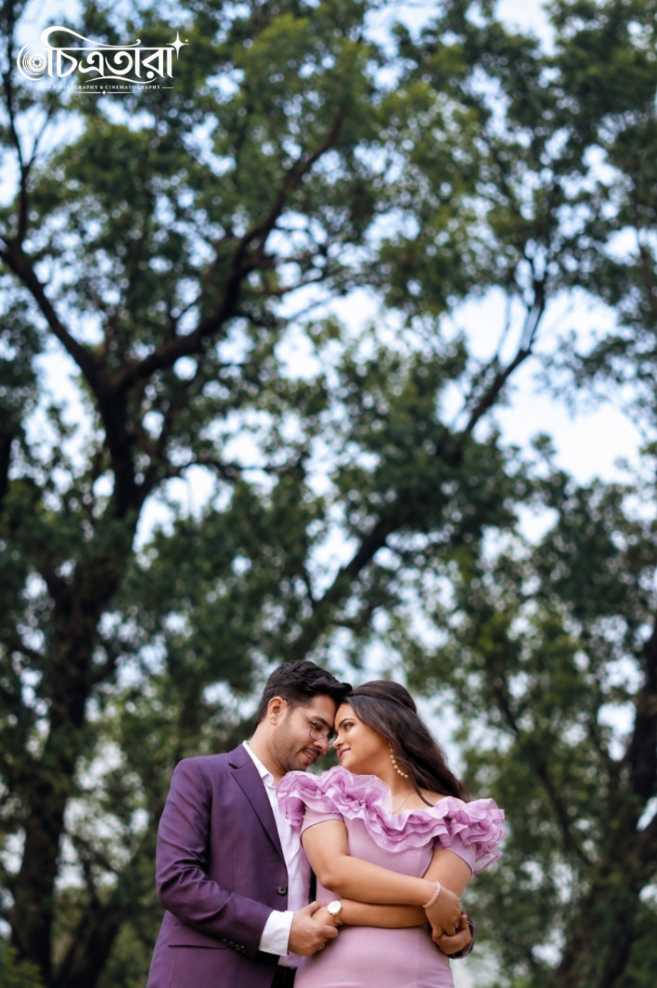 Couple portrait under trees