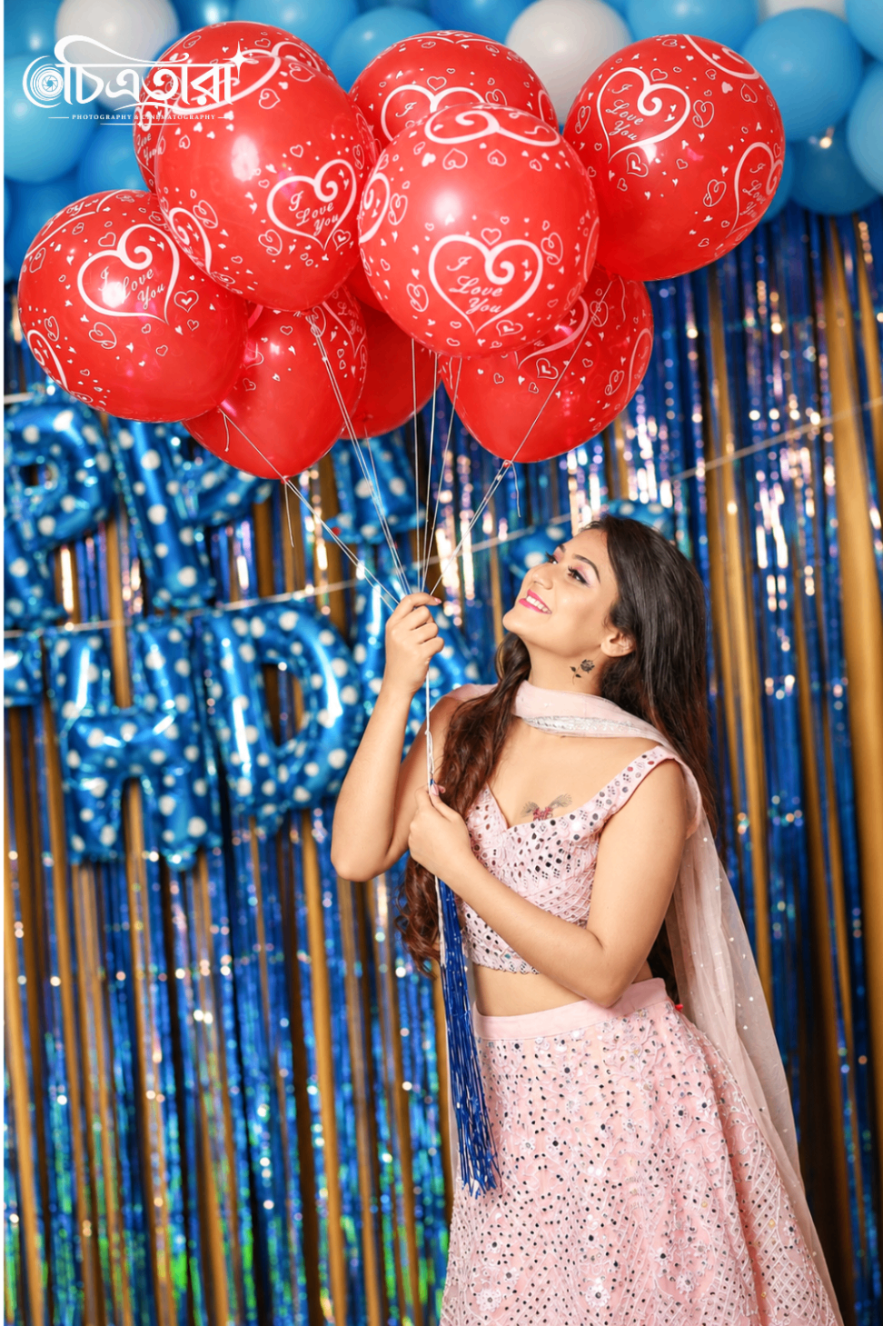 Portrait with red heart balloons